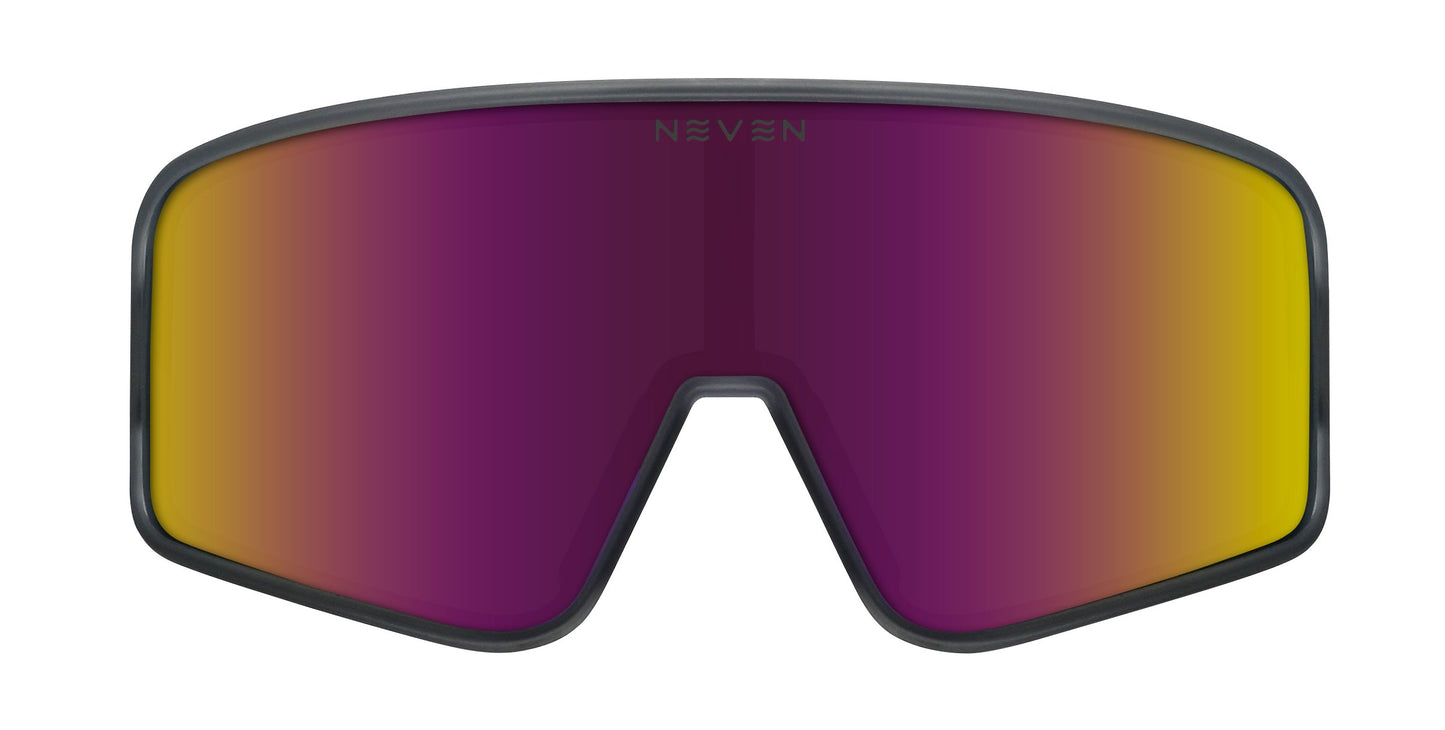 Front view of Mattingly by Neven Eyewear: oversized, frameless sunglasses with a single curved lens. The gradient tint shifts from deep purple to golden yellow. A thin black frame outlines the lens; "NEVEN" is subtly visible at the top center.
