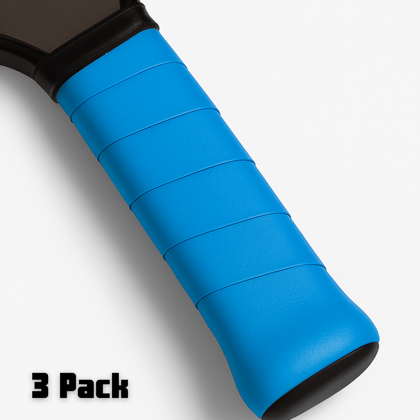 Close-up of an Edgy Pickleball Hybrid Overgrip-wrapped racket handle in bright blue, featuring textured overlapping layers for a tacky hold. The black handle end contrasts with “3 Pack” boldly printed in black on a white background.