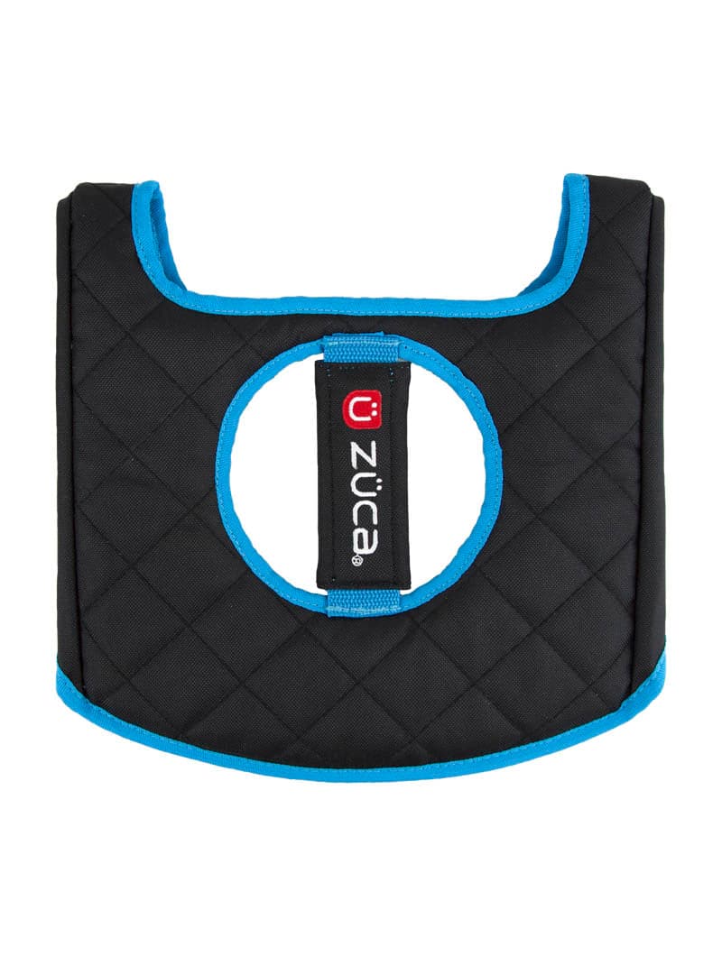The ZUCA Reversible Seat Cushion is a black, quilted, rectangular padded cover with bright blue trim, a large center hole, and a vertical ZUCA logo strip. It fits around objects for protection or carrying and has an open top.