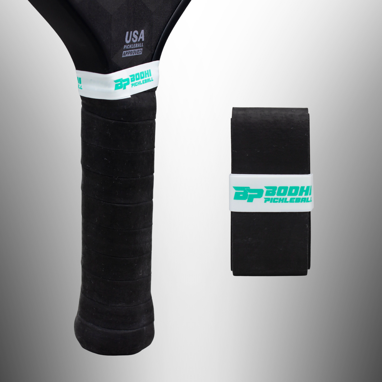 A close-up shows a black pickleball paddle handle wrapped in Bodhi Performance DRYtack™ Premium Pickleball Overgrips, featuring a textured, moisture-control grip and white band. A matching roll of overgrips is beside it on a light gray background.