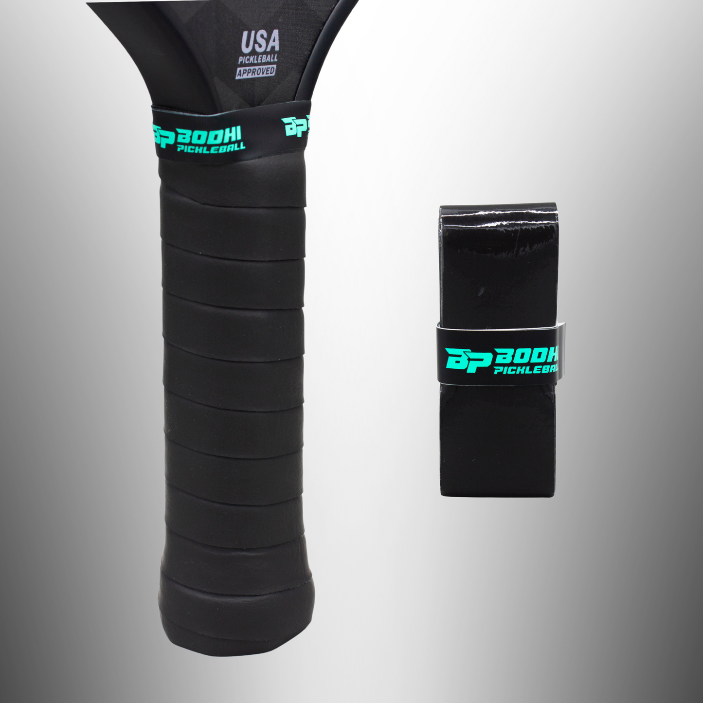 A close-up shows a black pickleball paddle handle wrapped with a tacky PROtack™ Premium Pickleball Overgrip by Bodhi Performance in teal. Next to it lies a rolled, black overgrip with matching teal branding, set on a white-to-gray gradient background.