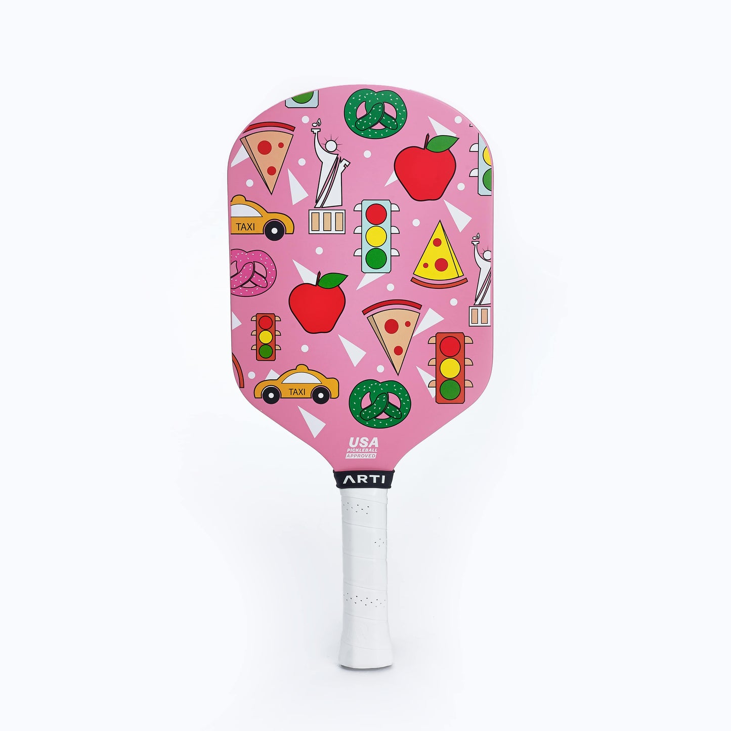 The ARTI Carbon Fiber "NEW YORK" Paddle features colorful New York icons on a pink face, T700 carbon fiber construction, a white handle with black tape, and a light gray background. USAPA approved.