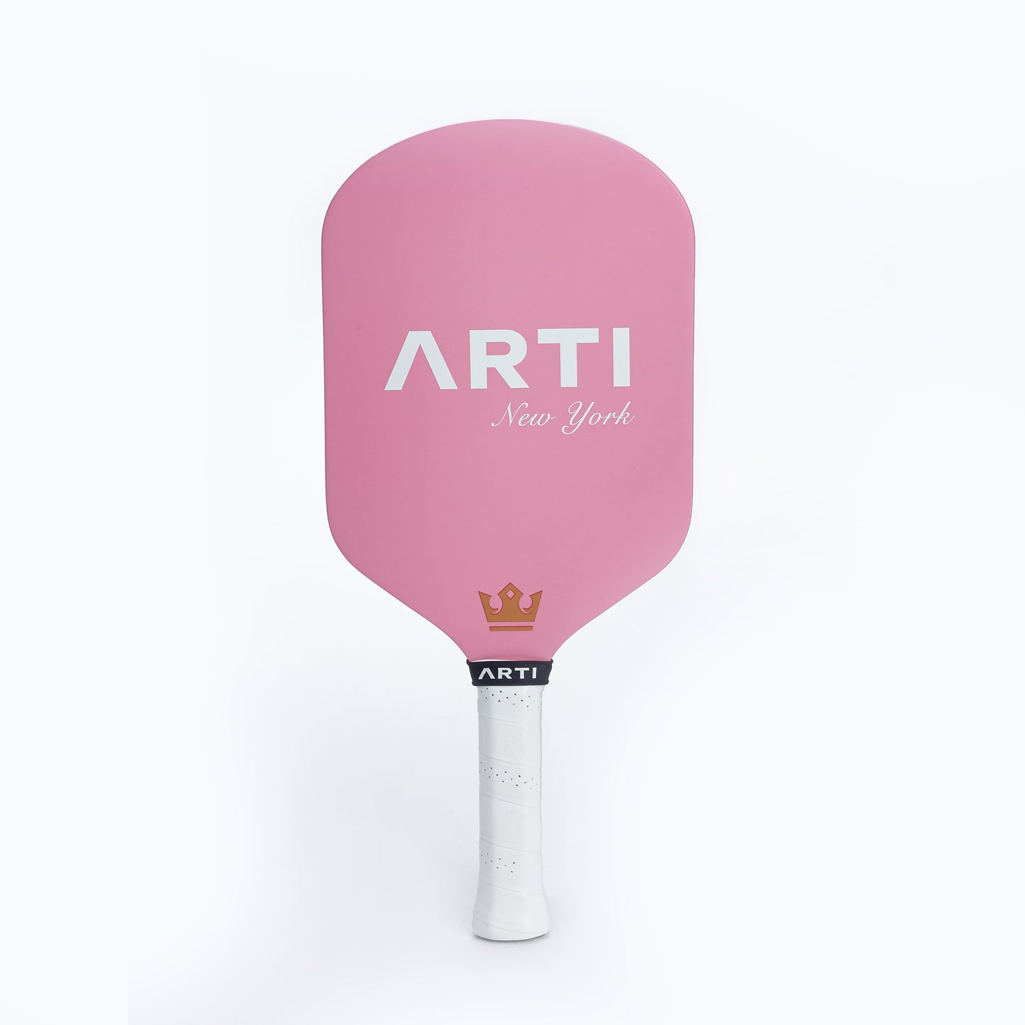 The ARTI Carbon Fiber "NEW YORK" Paddle by ARTI features a pink T700 carbon fiber face, white "ARTI New York" text near the top, a gold crown above the black handle with white grip tape, all set against a plain light gray background.