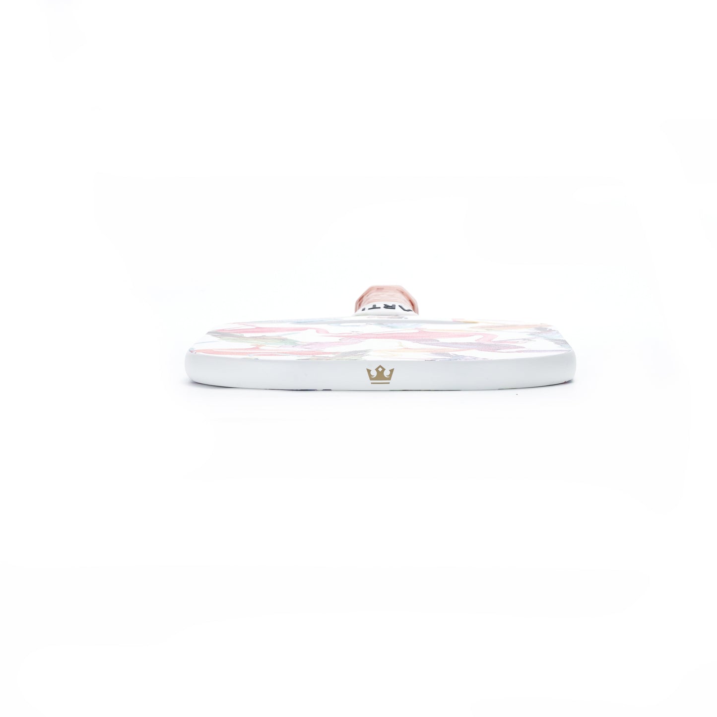 The ARTI Carbon Fiber EXOTIC TRIPIMAL "Flamingo" paddle with a floral design lies face up on a white surface. Its wood-textured handle points away, and a gold crown logo decorates the USAPA approved paddle’s white carbon fiber edge.