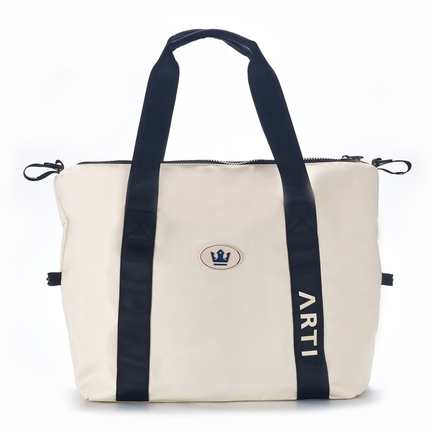 The ARTI Cream Duffle Bag by ARTI features black handles and accents, a circular patch with a navy crown and "ARTI" on a black strip, plus side black ties. Made of durable polyester and finished with a zippered top for secure storage.