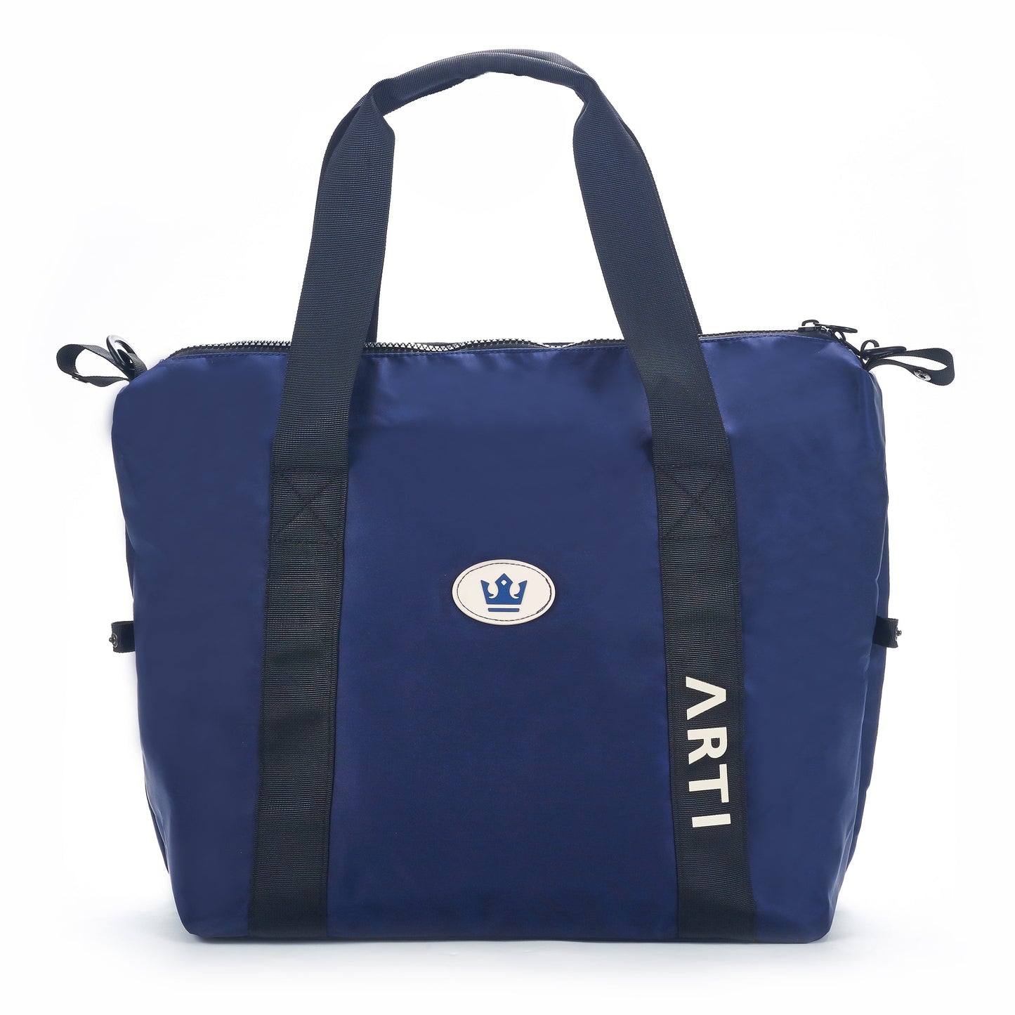 The ARTI Navy Duffle Bag by ARTI features navy polyester, black handles, vertical straps, a blue crown patch with "ARTI" in white, and a secure zipper closure—offering stylish versatility for travel.