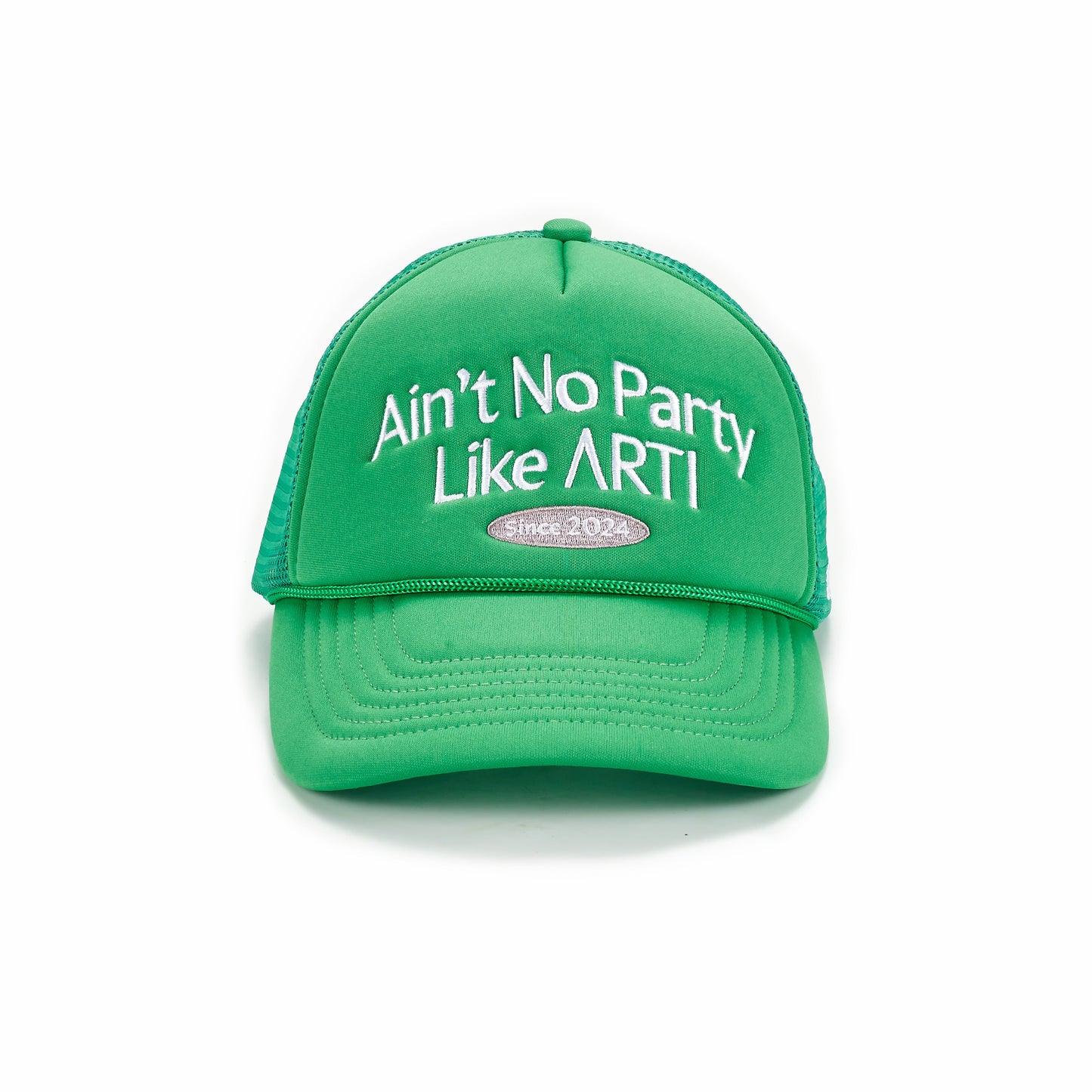 The ARTI “Ain’t No Party Like ARTI” Trucker Hat is a green mesh sports hat with white embroidered text and a small silver patch stating “Since 2024,” displayed centered on a plain white background.