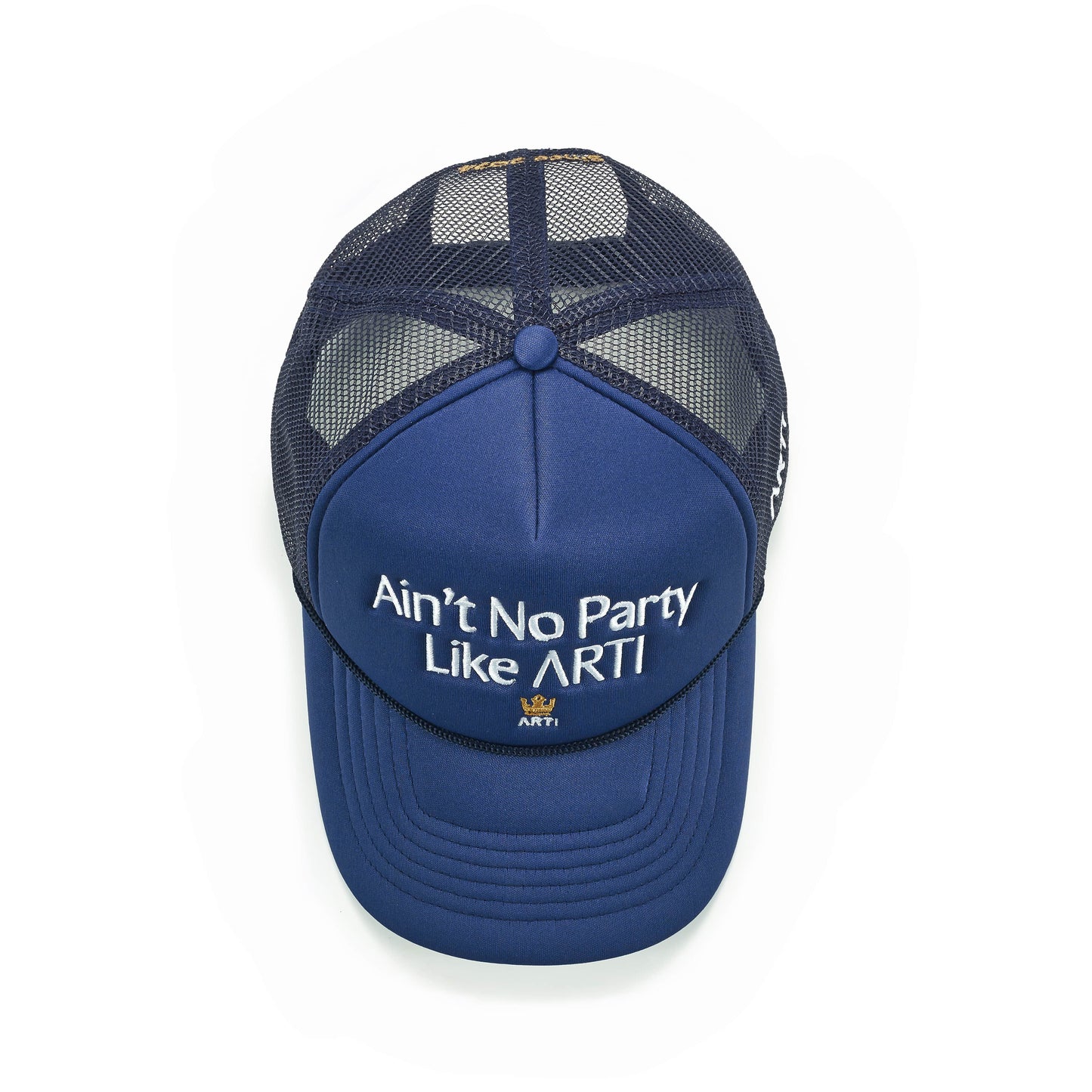 The ARTI "Ain't No Party Like ARTI" Trucker Hat is navy blue with white embroidered text, a gold crown logo, curved bill, and adjustable mesh back. Lightweight sports design. Shot from above on a white background.