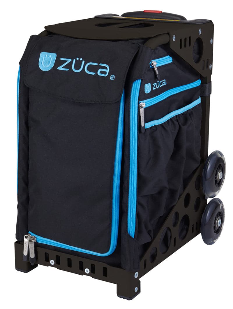 The ZUCA Pickleball Sport Black/Blue bag features a sturdy frame, side pockets, blue zippers, two large wheels, and a top handle. Ideal for pickleball gear, it sports the logo on the front flap and side pocket.