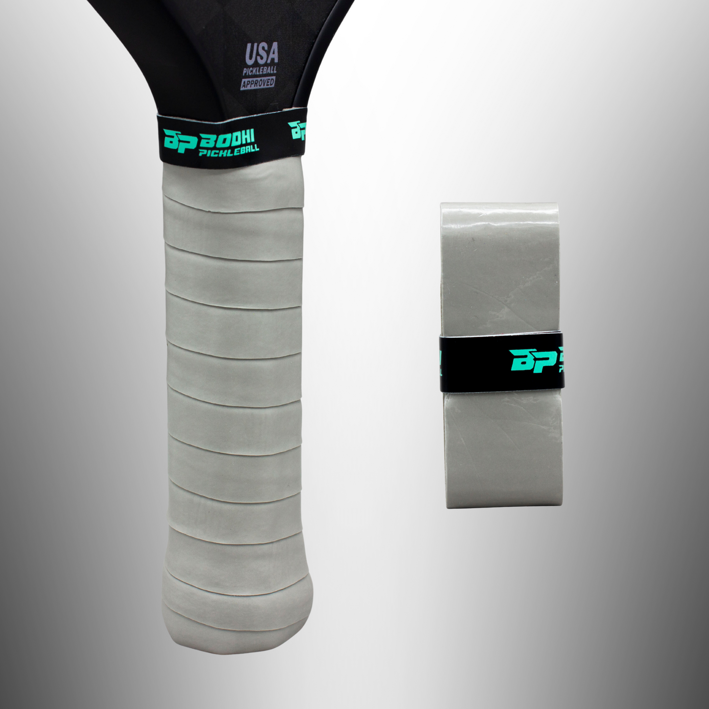 A close-up of a pickleball paddle handle wrapped in PROtack™ Premium Pickleball Overgrips by Bodhi Performance, shown beside an unused white overgrip roll with black and teal branding, set against a gray gradient background.