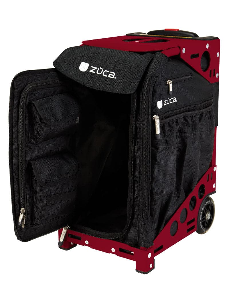 The ZUCA Pickleball Pro Black/Black is a rolling bag with a black fabric compartment, two large wheels, multiple zippered pockets, a telescoping handle, and sturdy metal frame for organized pickleball gear storage.