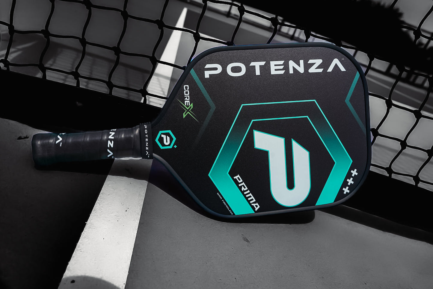 The PRIMA COREx paddle by Potenza Pickleball, with bold white "POTENZA" lettering and blue-green geometric designs, features COREx technology and displays COREX, PRIMA, and a stylized P logo on a grey-and-white outdoor court.