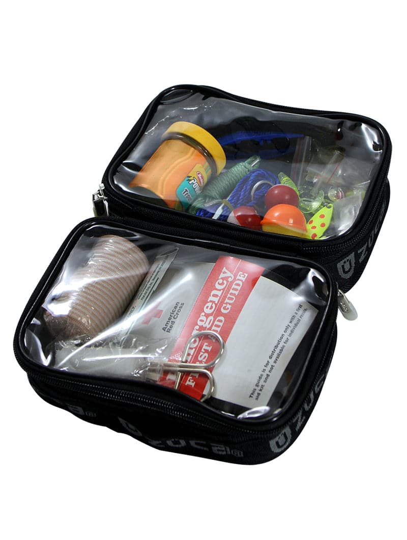 The ZUCA Mini Utility Pouch Duo is a black zippered organizer with clear covers and two compartments—top for toys and Play-Doh, bottom for a striped ball, first aid guide, bandages, and medical supplies—ideal for neat storage.