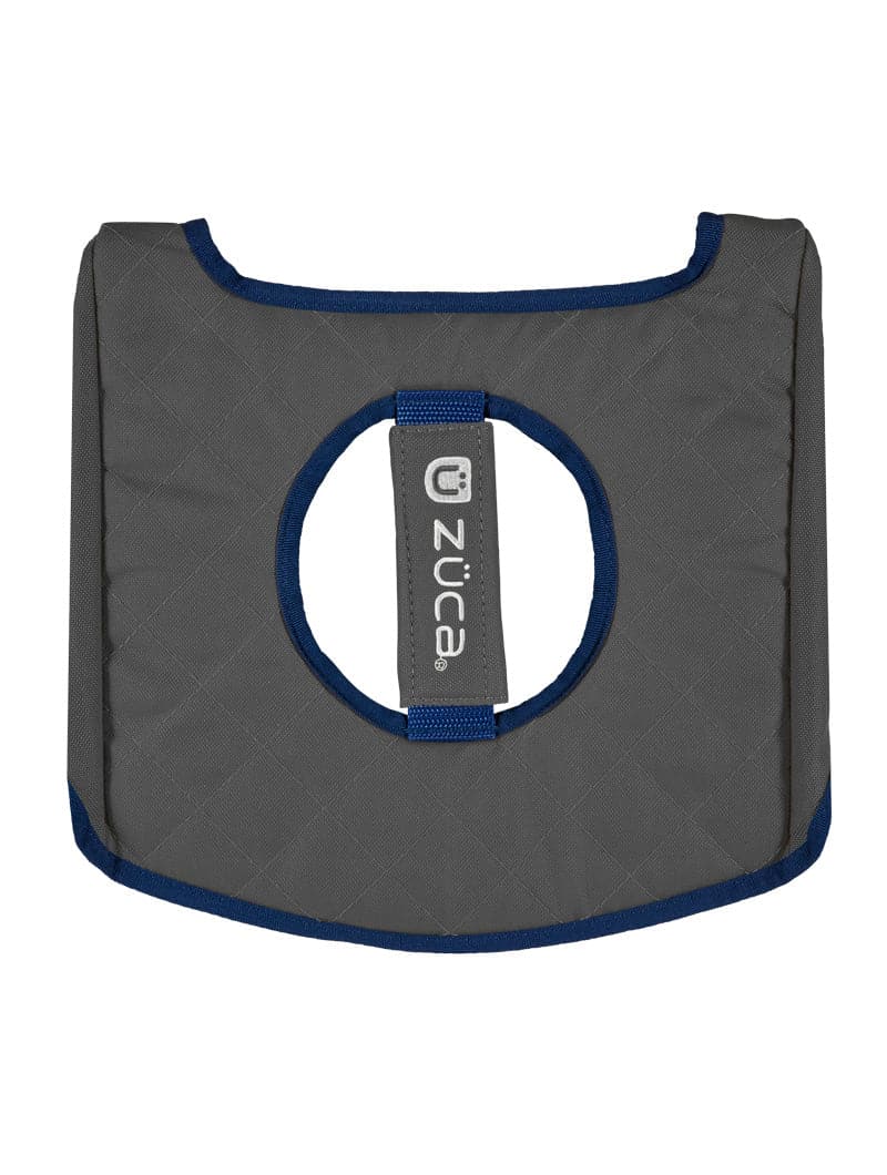 The ZUCA Reversible Seat Cushion is a rectangular gray padded accessory with a central circular opening, blue handle and trim, diamond stitching, and the white ZUCA logo—designed for comfort and protection.