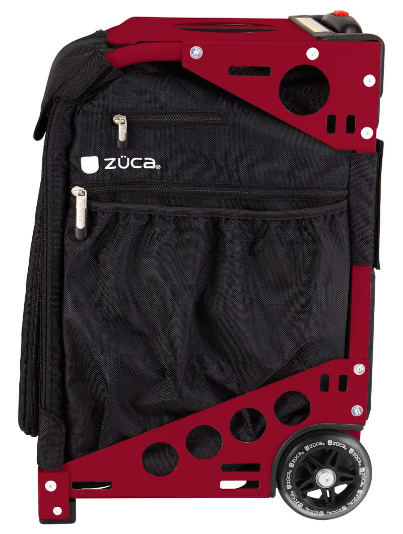 The ZUCA Pickleball Pro Black/Black rolling bag features a sturdy red frame, side pockets, two large black wheels, zippered compartments, mesh pockets, and the ZUCA logo on the front—perfect for storing your pickleball gear.