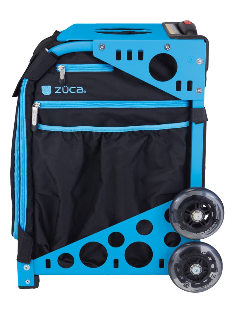 The ZUCA Pickleball Sport Black/Blue rolling bag features a sturdy metal frame with circular cutouts, top handle, side mesh pocket, zippered compartments, and two large transparent wheels—ideal for carrying and storing pickleball gear.
