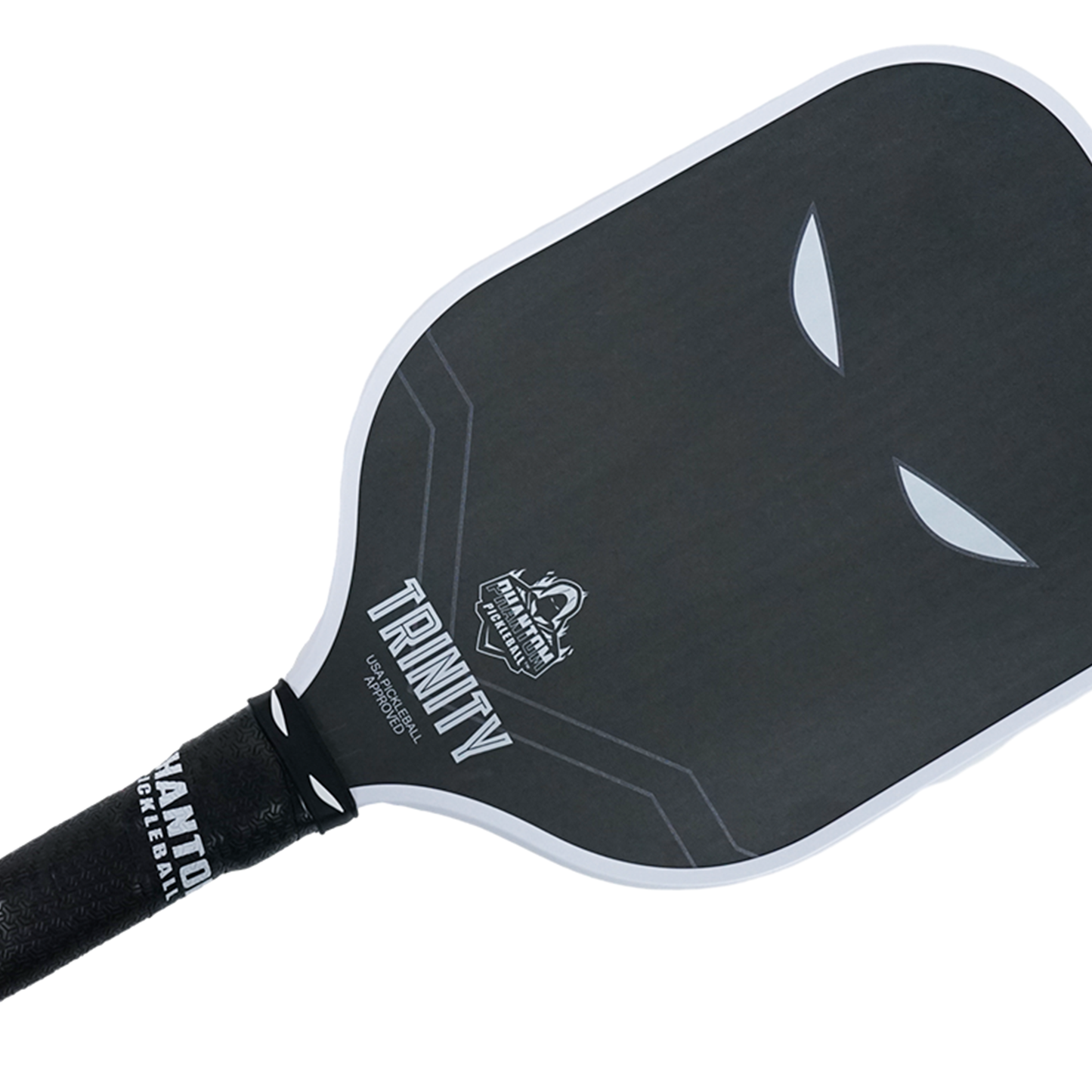 The Phantom TRINITY 14MM T700 Raw Carbon Fiber Thermoformed Pro Pickleball Paddle by Phantom Pickleball is matte black with two white, slanted eye-like shapes, a textured grip, and branding near the neck.