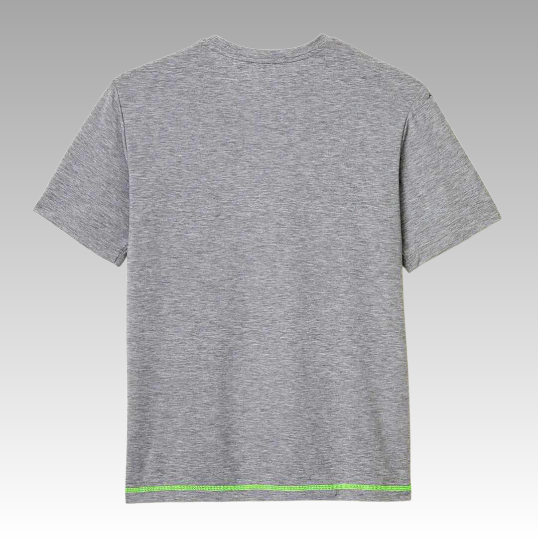 The Playly Store Warrior Tee is shown from the back, featuring a plain heather gray design with a crew neckline, athletic fit, and a thin green stripe near the hem. The shirt is set against a gray gradient background.