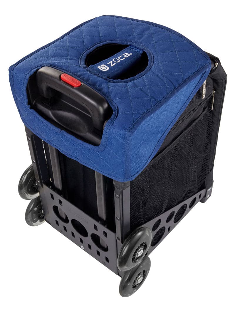 The black rolling utility cart is topped with a ZUCA Reversible Seat Cushion, featuring quilted blue padding, a circular handle opening, ZUCA logo, and mesh side pockets—a snug, stylish accessory for your cart.