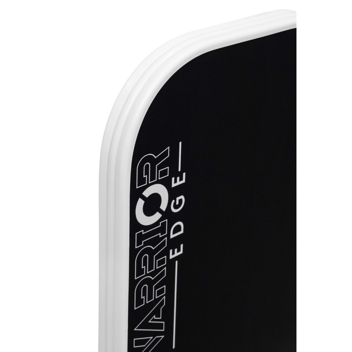 Close-up of the Diadem Sports Warrior Edge, a black rectangular object with rounded white edges. Bold “WARRIOR EDGE” text and glossy surface hint at an etched carbon face, suggesting it’s USAPA-approved sports equipment.