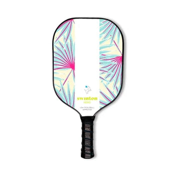 The Hero Palms Pickleball Paddle by Swinton Pickleball features a lightweight graphite face, black handle, white center stripe, and teal and magenta palm leaves with the Swinton brand name in yellow above the grip.
