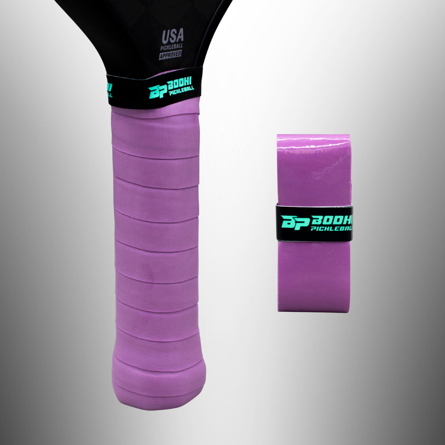 On the left, a pickleball paddle features a Bodhi Performance PROtack™ Premium Pickleball Overgrip in purple. To the right, an unused grip with a black and green Bodhi Pickleball band rests on a light gradient background.