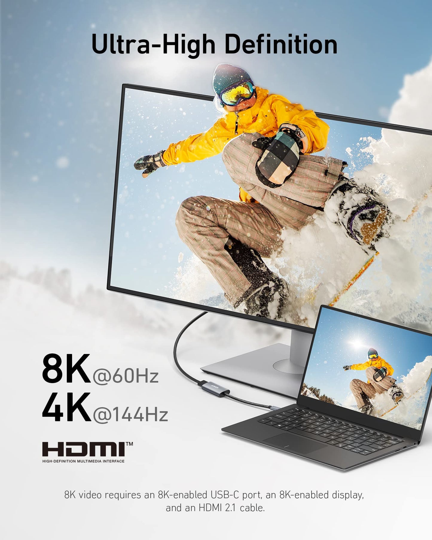A snowboarder in yellow rides through snow, shown on a big screen using the Anker 518 USB-C Adapter (8K HDMI), supporting Ultra-High Definition—4K@144Hz and 8K@60Hz—for brilliant clarity via a USB-C to HDMI connection.