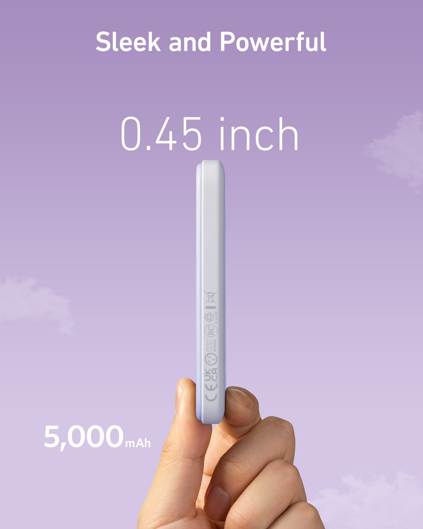 A hand holds the slim Anker 621 Magnetic Battery (MagGo) vertically against a purple sky. “Sleek and Powerful,” “0.45 inch,” and “5,000 mAh” highlight its wireless charging and battery capacity as clouds drift behind.