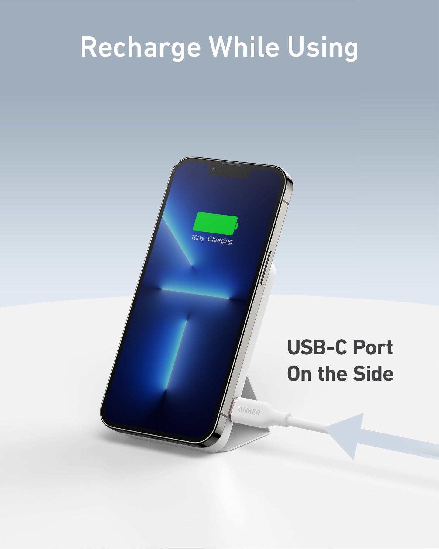 A smartphone shows a full battery on an Anker 622 Magnetic Battery (MagGo) wireless charging stand by Anker. A USB-C cable connects to the side, with “Recharge While Using” text and an arrow pointing to the USB-C port. Light blue background.