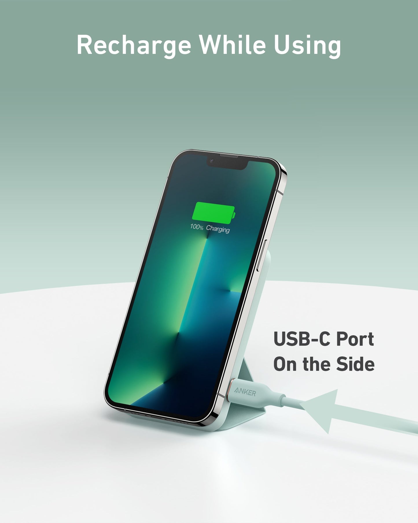 A smartphone with a green charging icon stands upright on the Anker 622 Magnetic Battery (MagGo) by Anker, featuring a foldable kickstand. Text above says "Recharge While Using," with an arrow pointing to the side USB-C port.