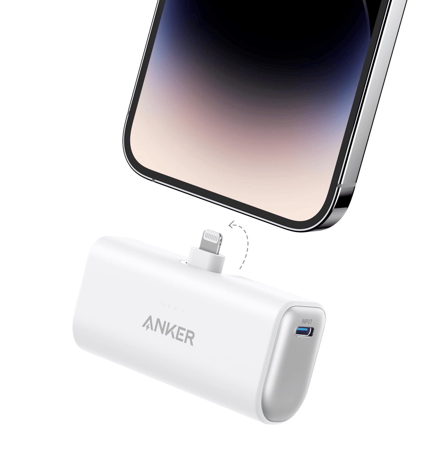 The Anker Nano Power Bank (12W, Built-In Lightning Connector) in white, with Anker logo, LED indicators, and a USB-C port on the side, is shown about to be plugged into an iPhone against a plain light gray background.