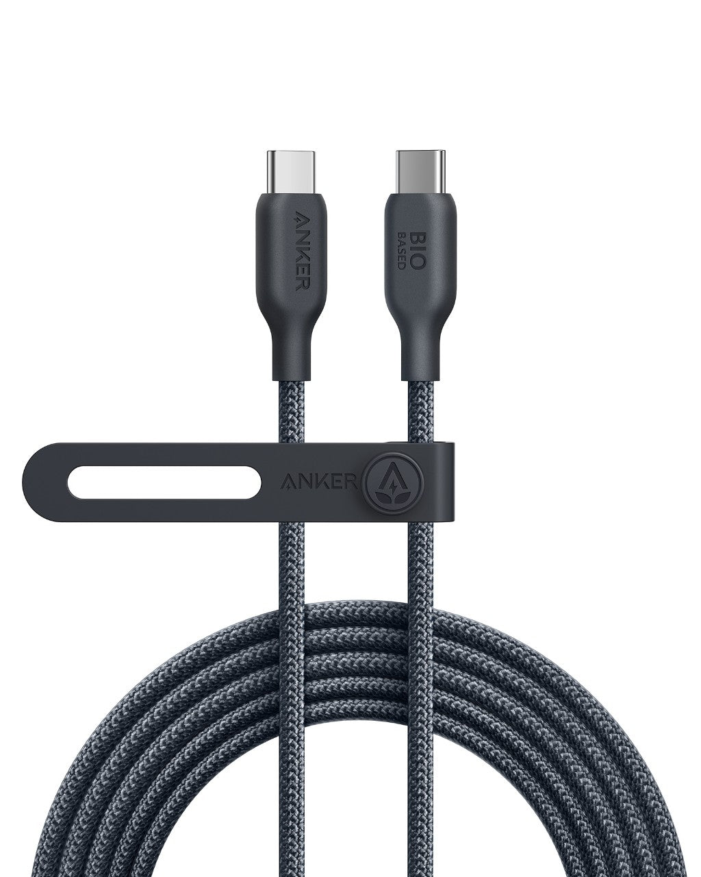The Anker 543 USB-C to USB-C Cable (Bio-Braided, 6 ft) appears coiled upright. Made of gray bio-based nylon, it features labeled connectors (“ANKER” and “BIO BASED”) and is secured with a black Anker-branded strap.