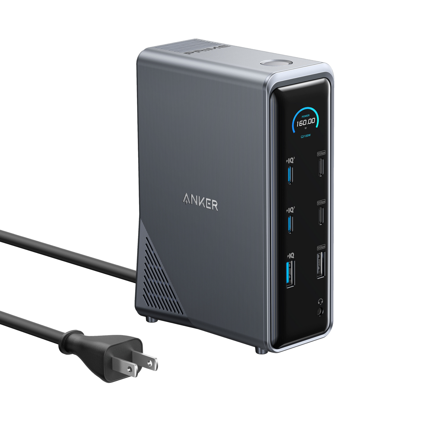 A silver Anker Prime Charging Docking Station (14-in-1, Dual Display, 160W) with four USB ports, one USB-C port, a standard outlet, LED display showing 160.00, and a black two-prong power cord. The background is white.