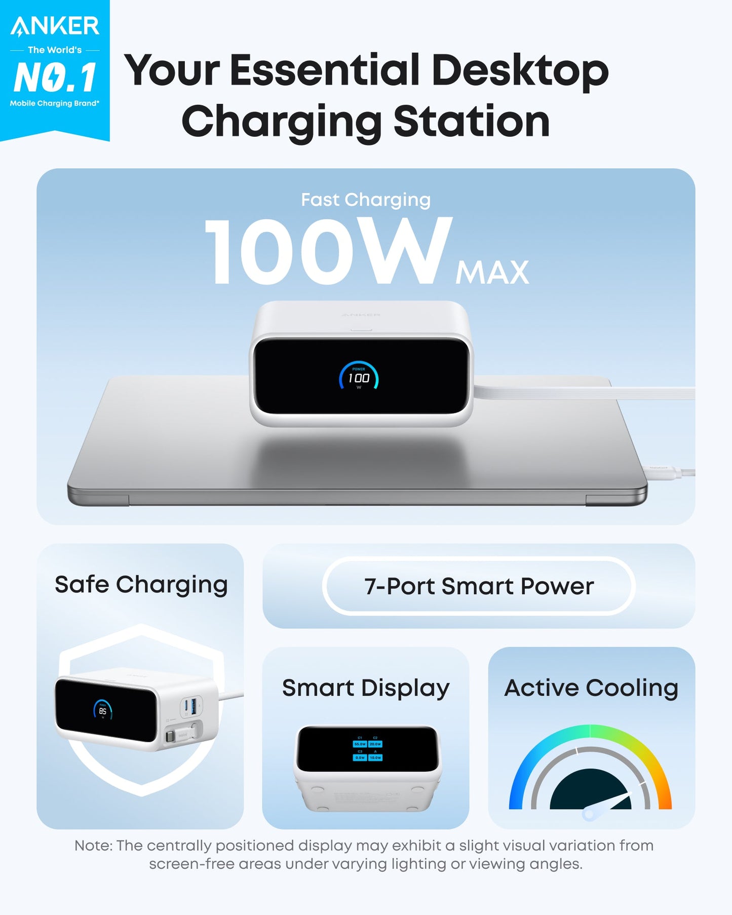 A white Anker Nano Charging Station (7-in-1, 100W) rests on a silver laptop, showing “100” on its smart display. Features include 100W USB-C charging, safe charging, active cooling, and retractable USB-C cables with colorful graphics.