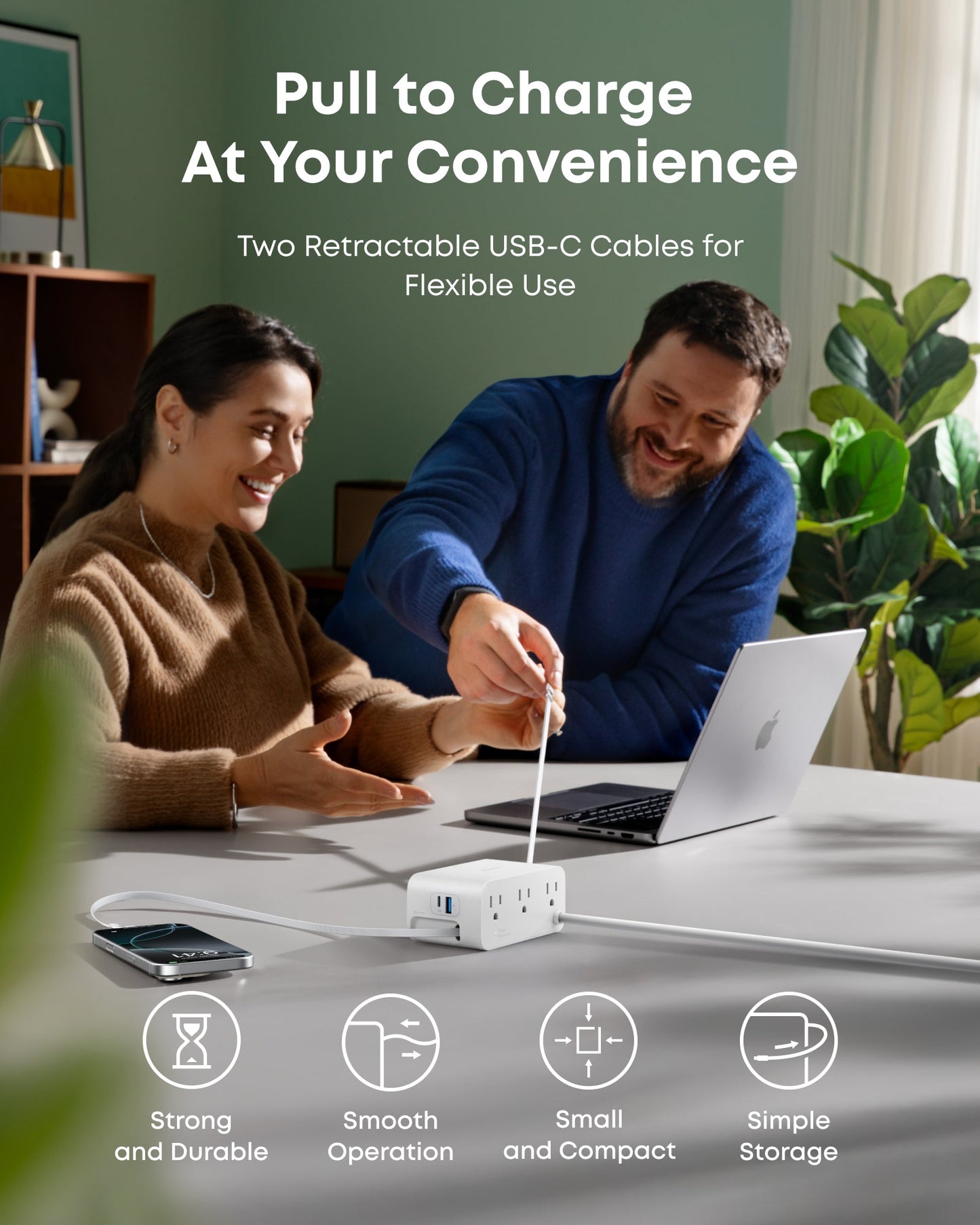 A smiling man pulls a retractable USB-C cable from the white Anker Nano Charging Station (7-in-1, 100W) as both use laptops at the table. Text reads “Pull to Charge At Your Convenience;” icons show the compact Anker hub’s 7-in-1 benefits.