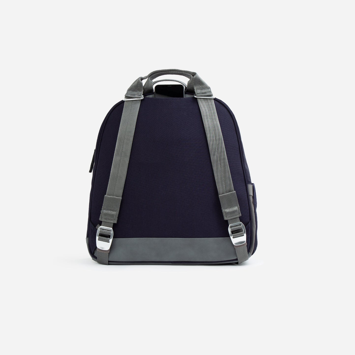 The Doubletake MELBOURNE Pickleball Backpack & Tote in navy blue features water-resistant fabric, gray adjustable straps, a gray handle, and a gray bottom accent. Its tip-free design offers stability, ideal for minimalist pickleball enthusiasts.