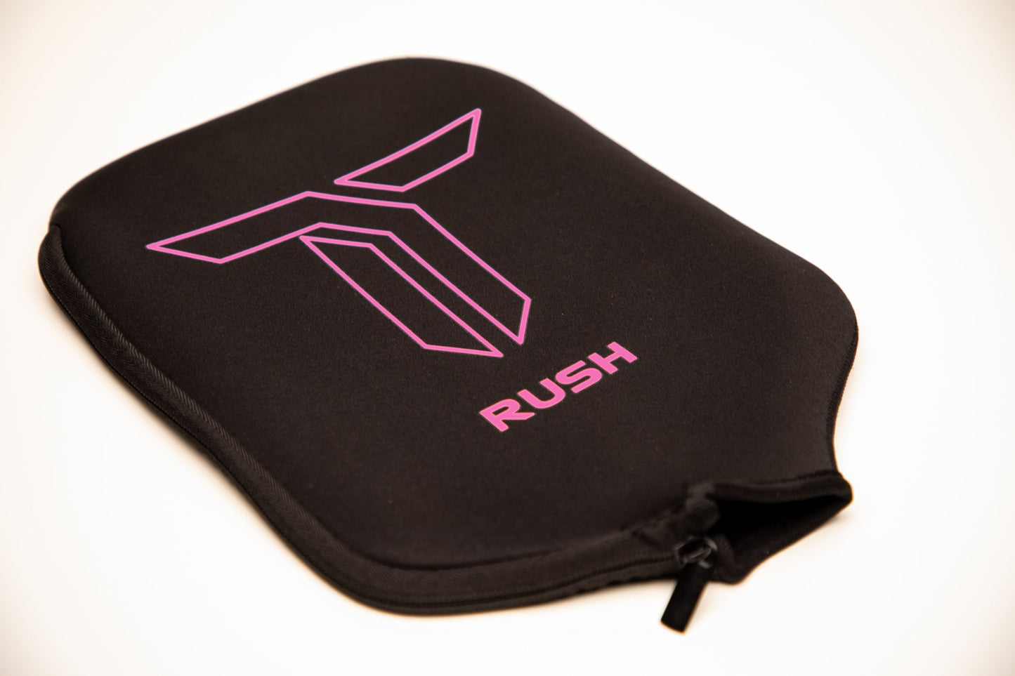 The RUSH 13 (PINK) by Thrive Pickleball comes with a custom weight card, paddle cover, paddle eraser, and lead weights—perfect for carrying and protecting your elongated pickleball paddle in style.