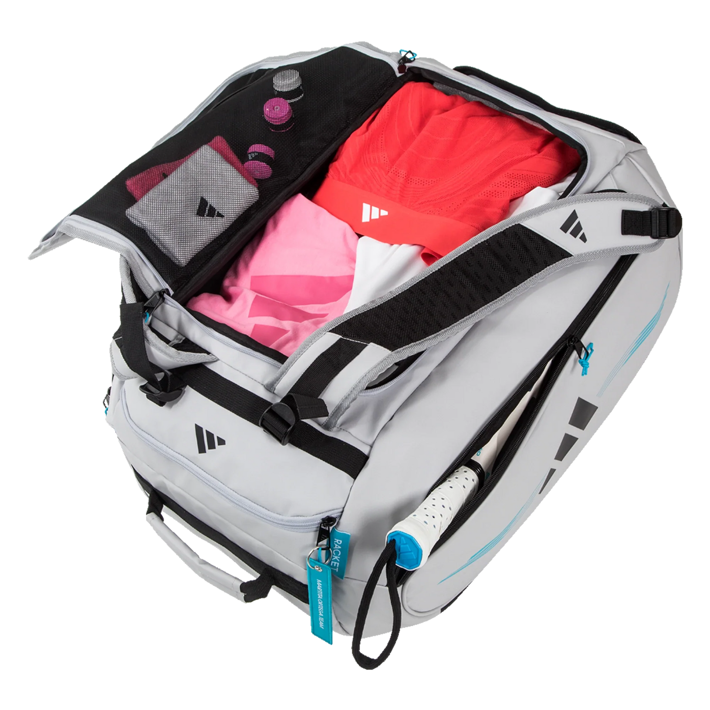 The Adidas PROTOUR OFFWHITE Racket Bag 3.4 by Padel USA is open, with folded pink, red, and white clothes in its main compartment; small items are stored in the inner mesh pocket, and a tennis racket handle extends from the side compartment.