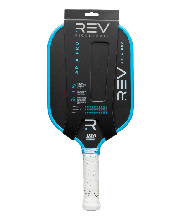 The ARIA PRO Pickleball Paddle by REV Pickleball features a carbon fiber black face, blue edge, white handle, and comes with “REV Pickleball ARIA PRO” branding plus specs printed on it. It includes a protective sleeve over the face and handle.
