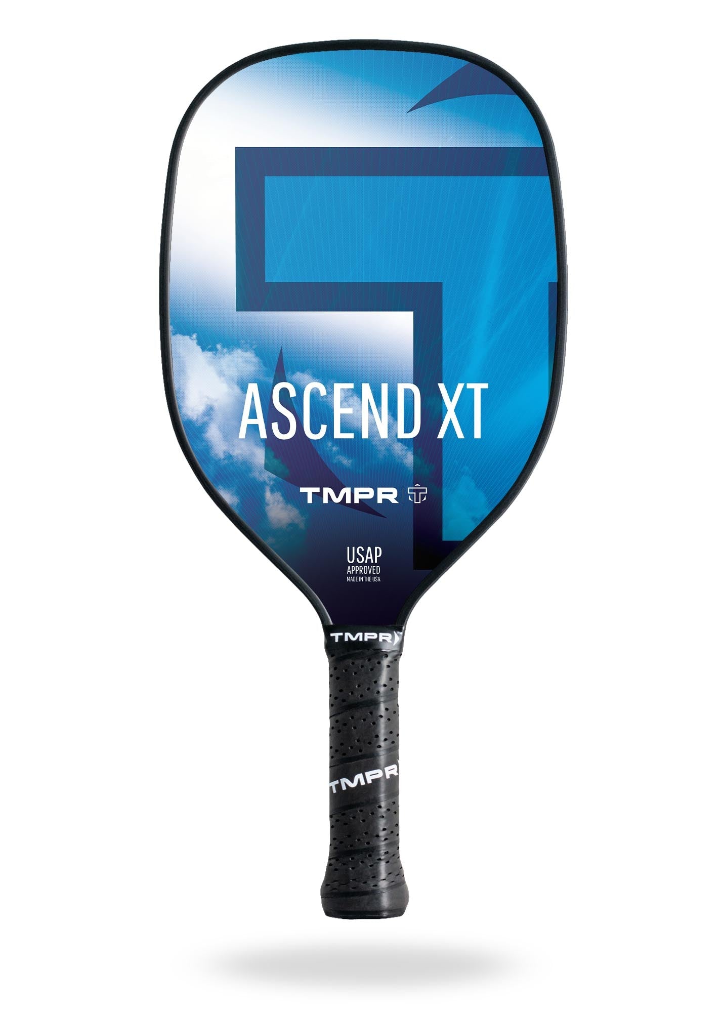 The Ascend XT by TMPR Sports features a blue paddle with a bold geometric “T” design, white “ASCEND XT” text, and TMPR & USAP logos. Its black handle offers a textured grip and vibration dampening, shown against a partly cloudy sky.