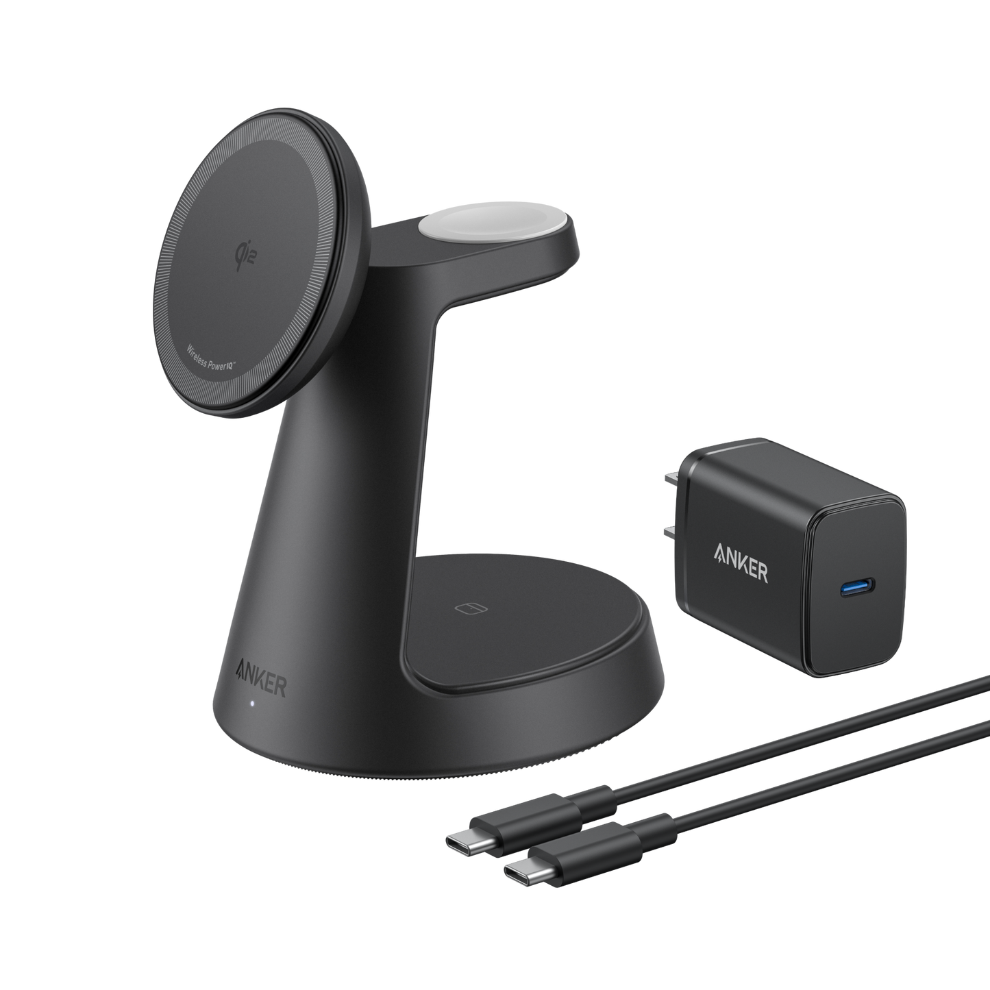 The Anker MagGo Wireless Charging Station (3-in-1, Dock Stand) in black is shown with a circular MagSafe charger, Apple Watch holder, matching USB-C wall adapter, and two black USB-C cables on a white background. Supports up to 15W wireless charging.