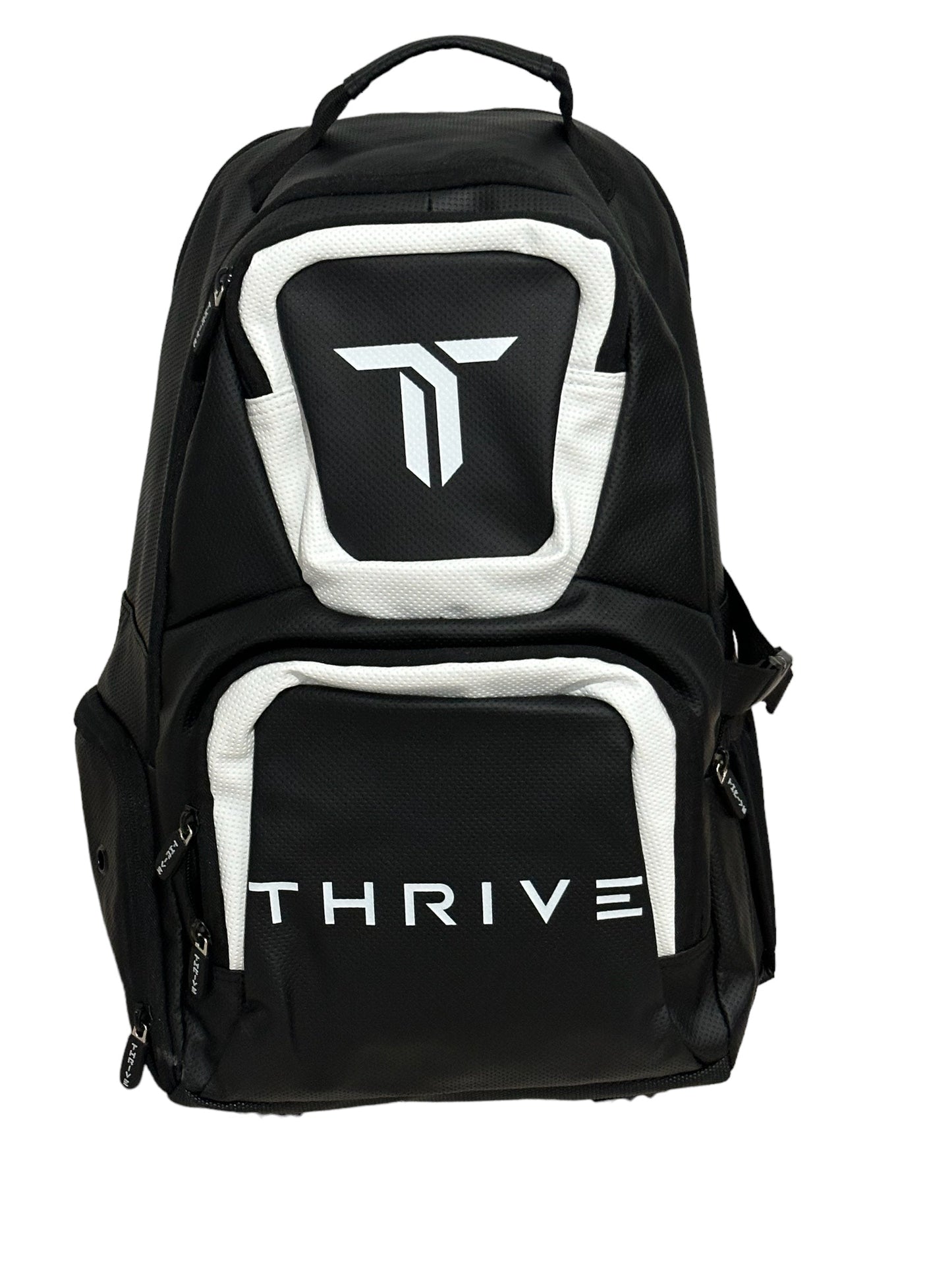 The Thrive Pickleball Elite Backpack w/shoe bag is a black vegan leather backpack with white accents, a stylized T logo on the upper pocket, "THRIVE" in bold below, multiple zippered sections, and a sturdy top handle.