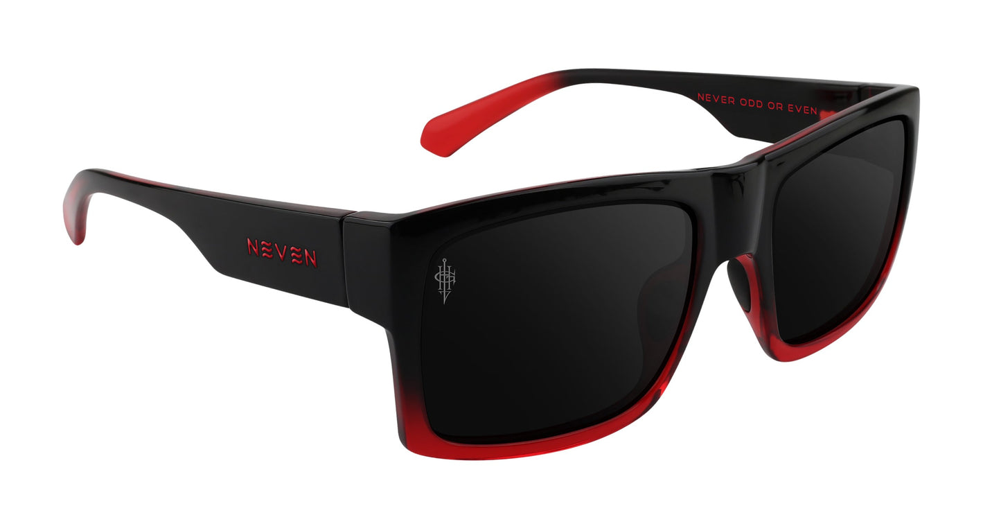Blood Fade sunglasses by Neven Eyewear feature polarized black-red frames with glossy red fade on the bottom and inside arms, black lenses, "NEVER ODD OR EVEN" printed in red on the inner arm, and a small white symbol on one lens.