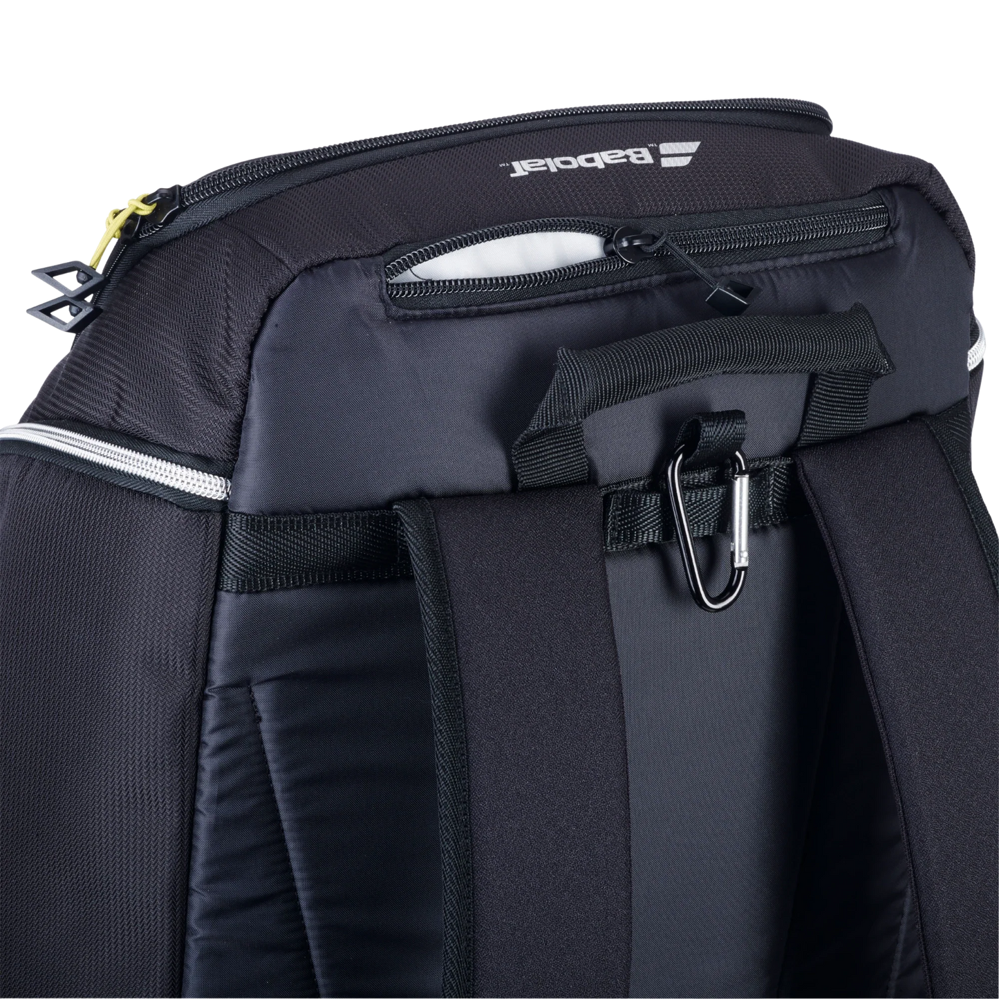 Close-up of the black Babolat RH PERF PADEL 2nd Gen bag from Padel USA, featuring padded shoulder straps, a carabiner clip, small zip pocket, sturdy stitching, racket protection, yellow zipper pull on the main compartment, and the white Babolat logo.