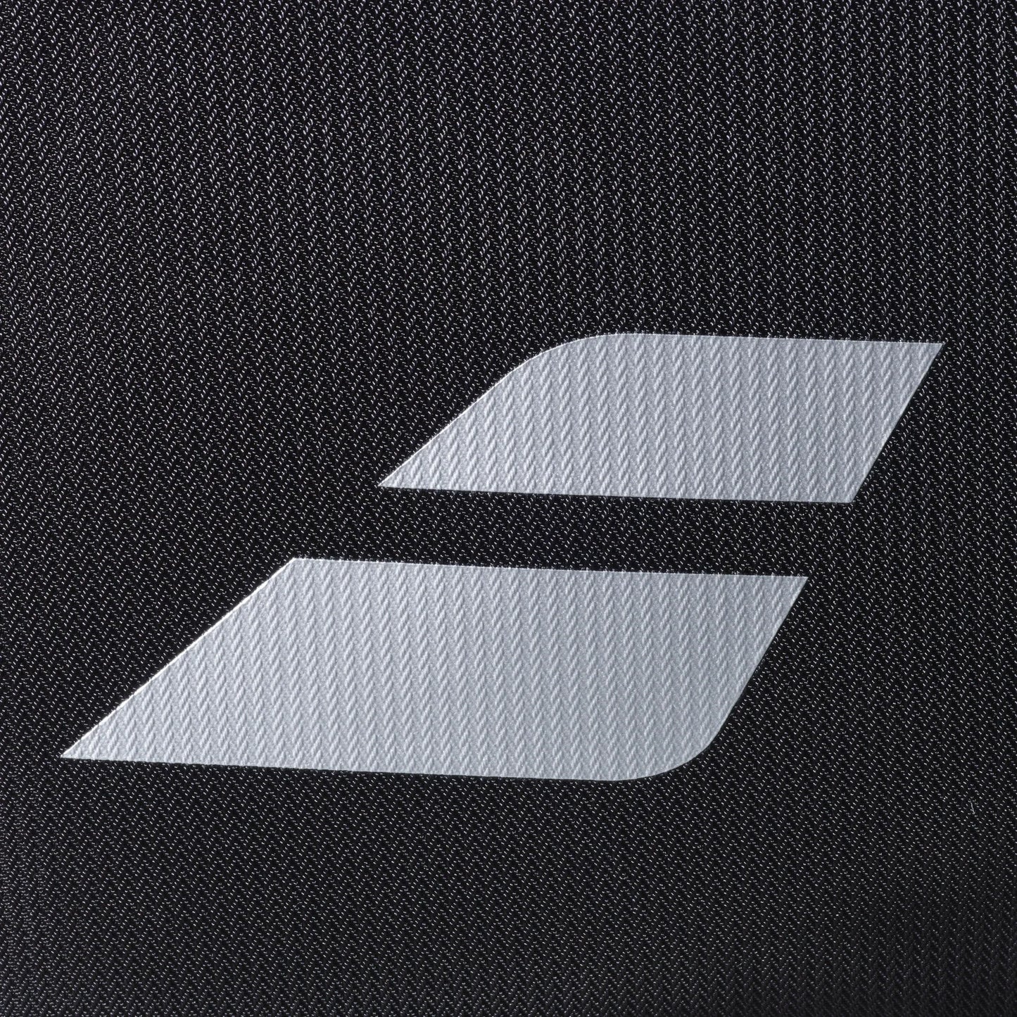 The Babolat RH PERF PADEL 2nd Gen by Padel USA is a black waterproof padel bag with a textured fabric and minimalist white logo—two slanted rectangles—designed for sleek functionality and extra racket protection.