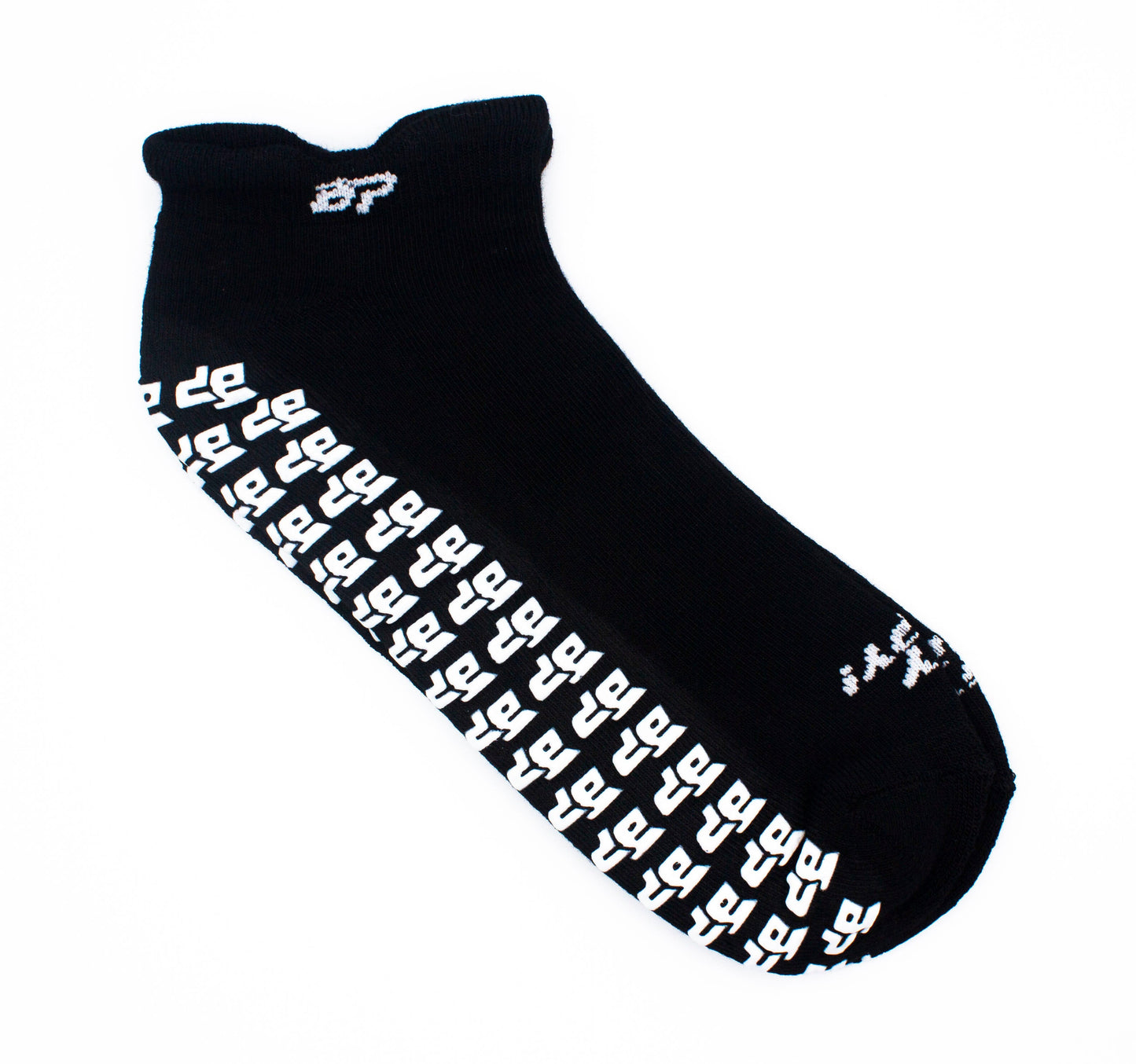 A single black Bodhi Performance GRIPtech™ sock displays a white "dp" pattern along the side and toe, plus a small "dp" logo near the ankle cuff. The sock is photographed on a plain white background.