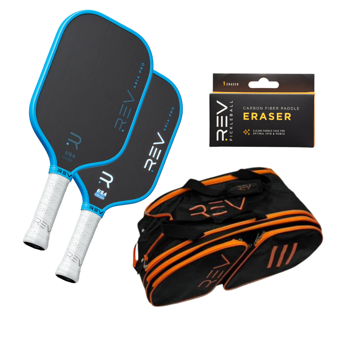The REV Pickleball Professional - Mix & Match - Bundle for 2 includes two black-and-blue paddles with white grips, a carbon fiber eraser in box, and a black sports bag with orange accents, all on a white background.