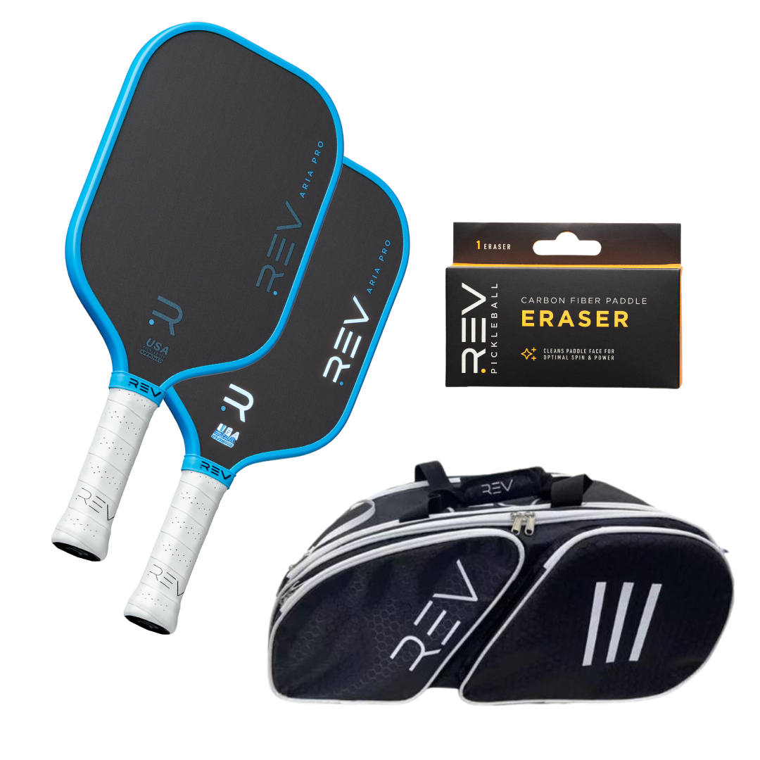 The REV Pickleball Professional - Mix & Match - Bundle for 2 includes two blue-edged paddles with white grips, a black sports bag with white accents, and a black packaged carbon fiber paddle eraser against a white background.