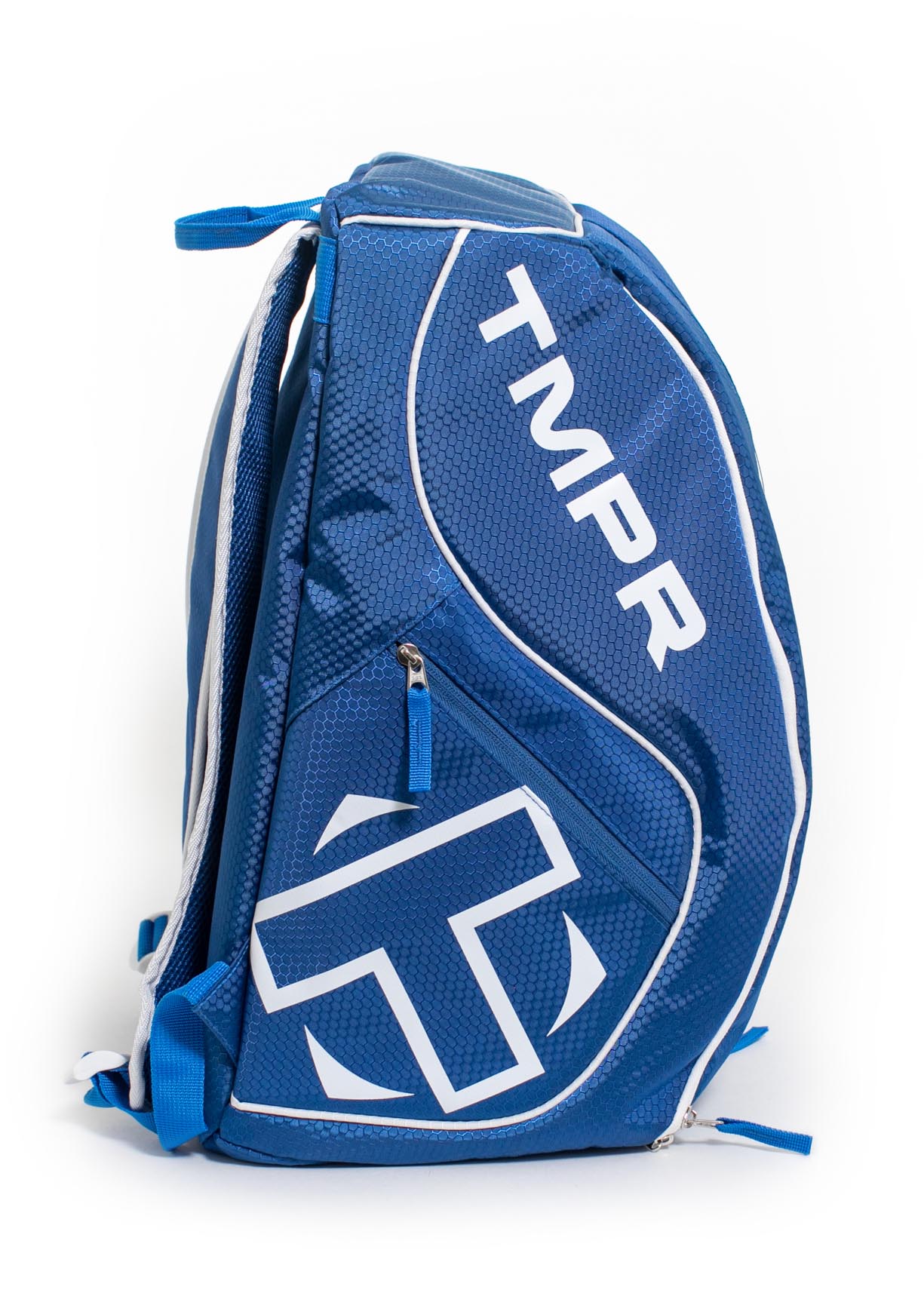 The TMPR Sports Tour 2 Backpack stands upright and features white piping, bold TMPR branding, a large stylized T logo, hexagonal textured pattern, side zipper pocket, and blue straps with white accents.
