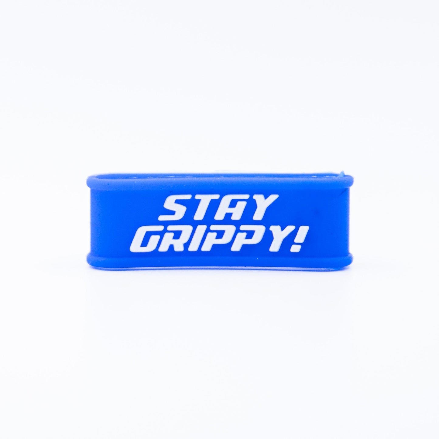 A blue rectangular Paddle Band by Bodhi Performance with rounded edges is shown on a white background, featuring bold white “STAY GRIPPY!” text—a playful and functional Pickleball paddle accessory.